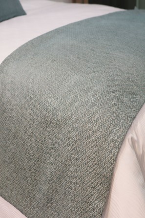 Plaid tejido estampado zig-zag turquesa